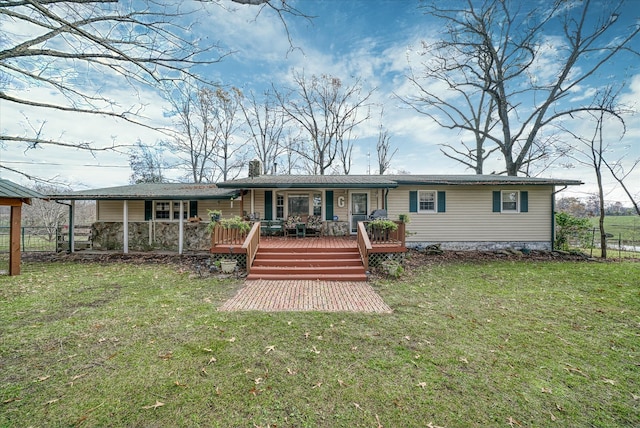 back of house with a lawn