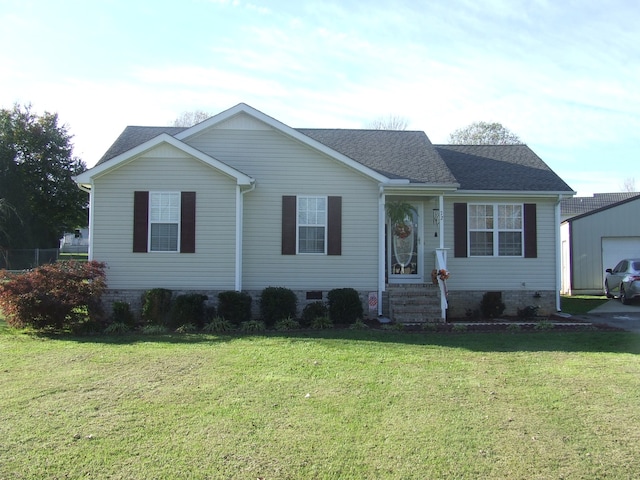 ranch-style home featuring a front lawn