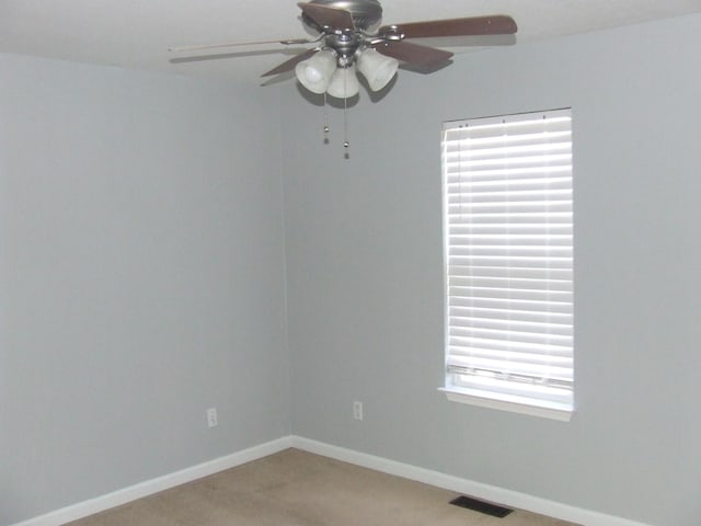 unfurnished room featuring ceiling fan