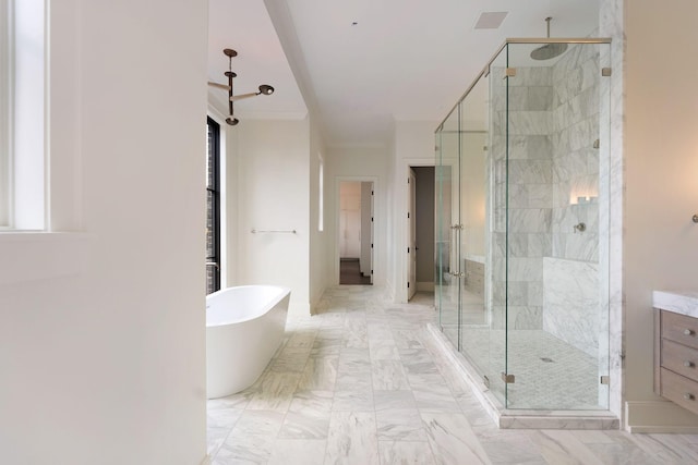 bathroom with a freestanding bath, visible vents, marble finish floor, and a stall shower