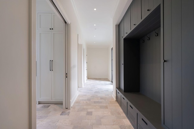 mudroom featuring recessed lighting and ornamental molding