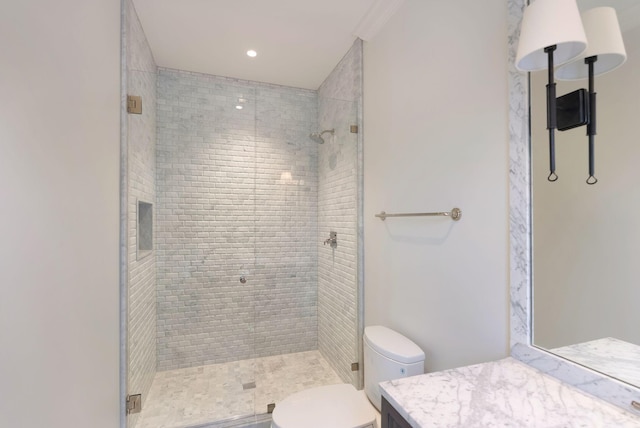 full bath featuring vanity, a shower stall, toilet, and recessed lighting