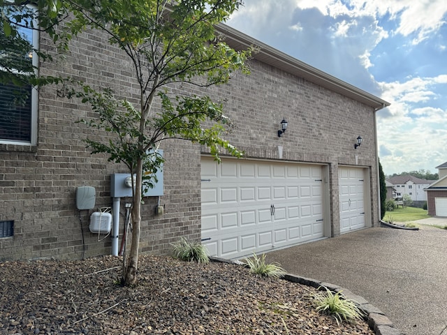 view of home's exterior with a garage