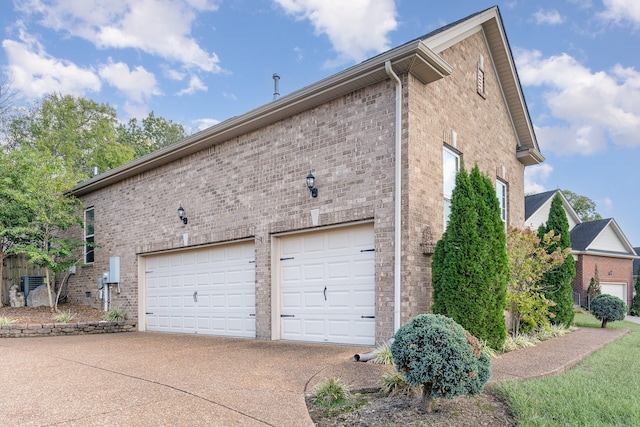 view of side of property featuring a garage