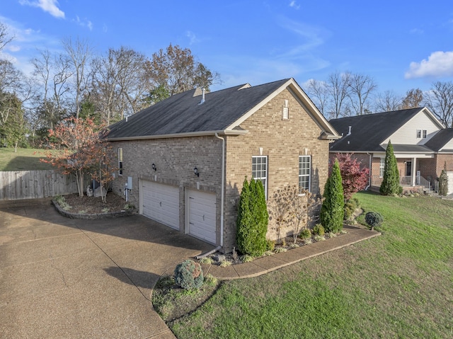 view of property exterior with a lawn and a garage