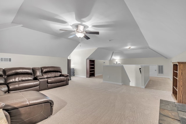 carpeted cinema featuring vaulted ceiling and ceiling fan