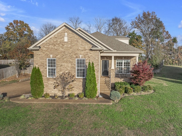 view of front of home with a front lawn