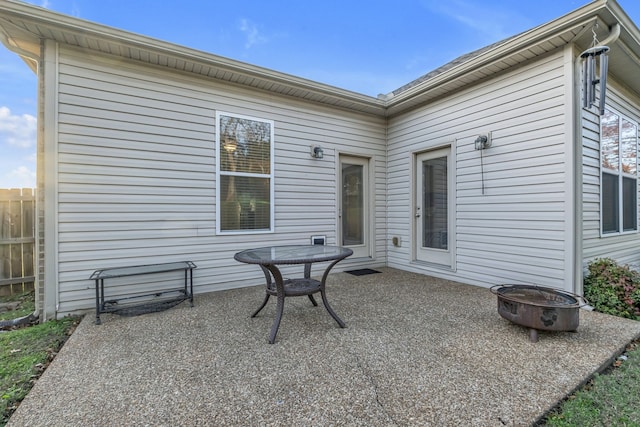 view of patio / terrace with an outdoor fire pit