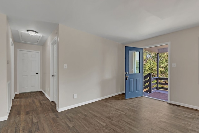 entrance foyer with dark hardwood / wood-style floors