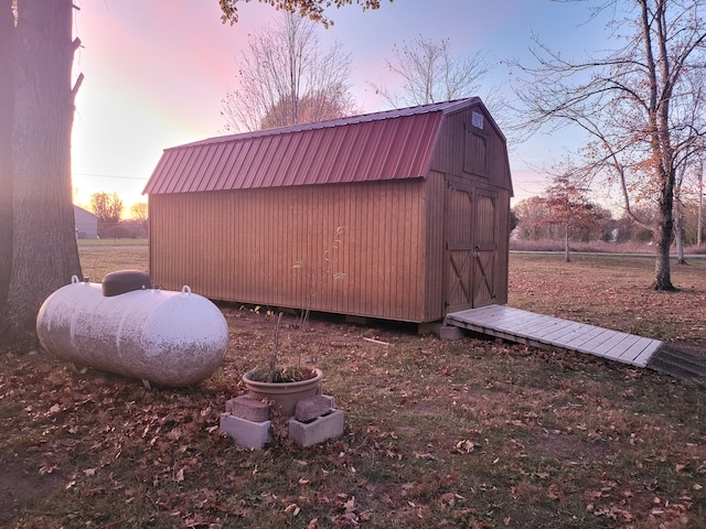 view of outdoor structure at dusk