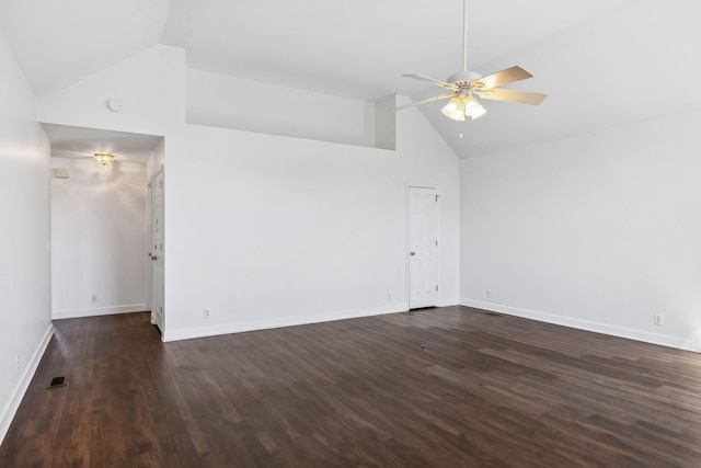 empty room featuring dark wood-type flooring, high vaulted ceiling, and ceiling fan