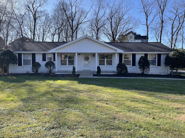 single story home featuring covered porch and a front yard