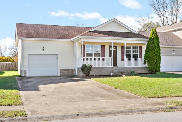 single story home with a front yard, a porch, and a garage