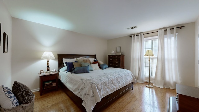 bedroom featuring light wood-type flooring