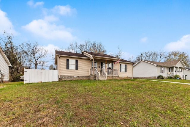 single story home with covered porch and a front lawn