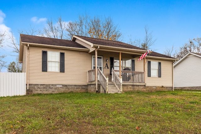 single story home with covered porch and a front lawn