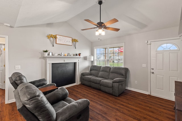 living room with ceiling fan, dark wood-type flooring, and lofted ceiling