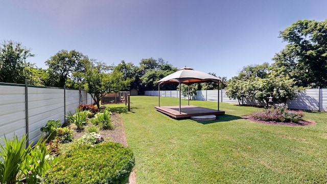 view of yard with a gazebo and a deck