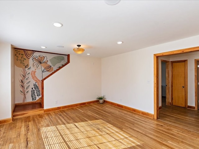 spare room featuring light hardwood / wood-style flooring