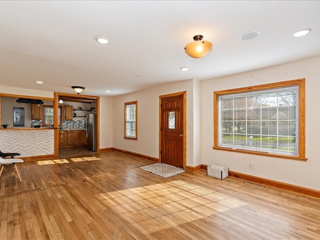 entrance foyer featuring light hardwood / wood-style flooring