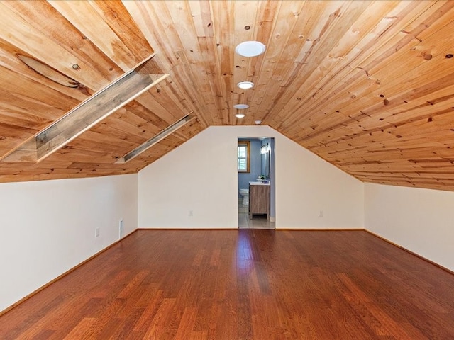 bonus room with vaulted ceiling, hardwood / wood-style floors, and wooden ceiling