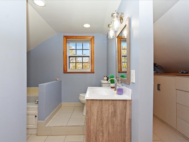 bathroom with tile patterned flooring, vanity, toilet, and lofted ceiling