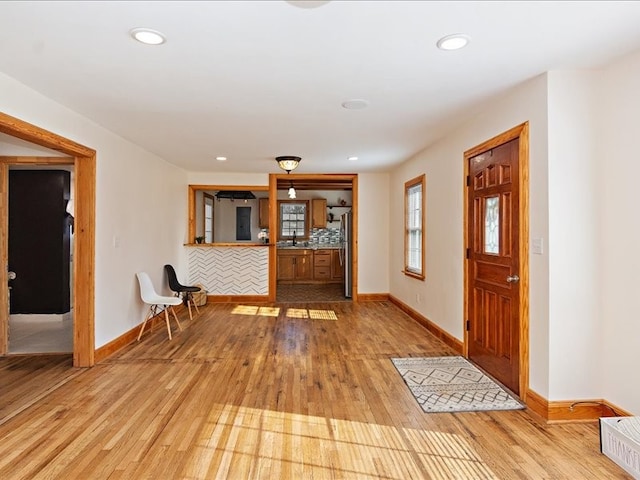 entrance foyer with light wood-type flooring