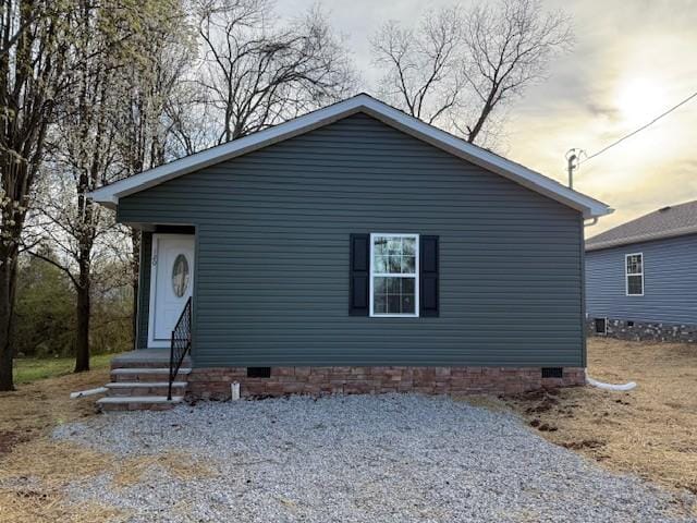 view of front of house featuring crawl space