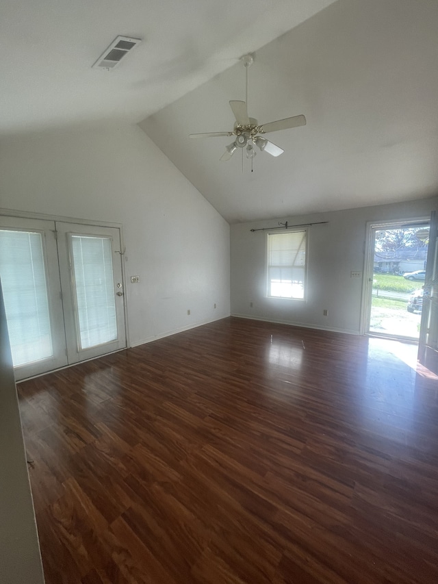 unfurnished room featuring lofted ceiling, ceiling fan, and dark hardwood / wood-style floors