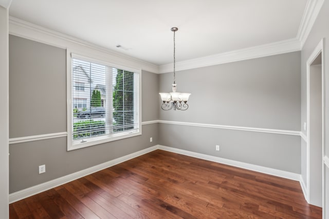 unfurnished dining area with a notable chandelier, dark hardwood / wood-style floors, and crown molding