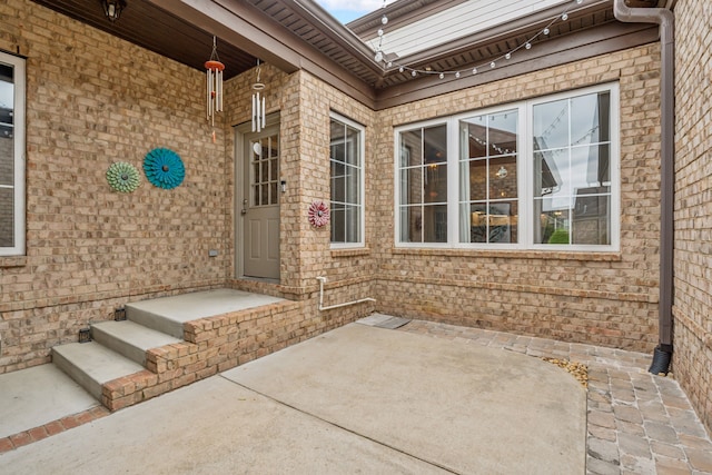 property entrance with a patio area