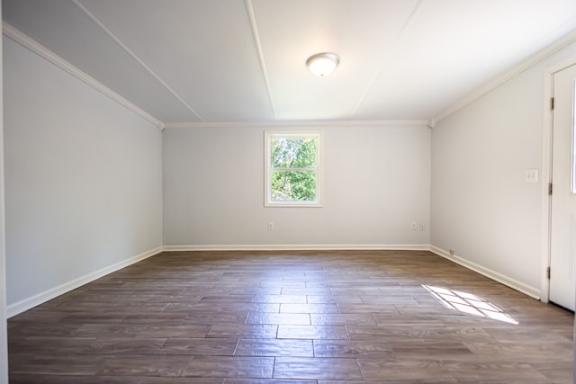 unfurnished room featuring hardwood / wood-style flooring and crown molding