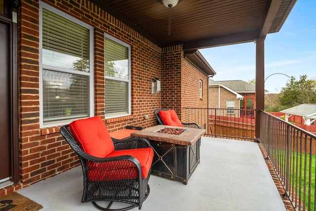 view of patio featuring an outdoor fire pit