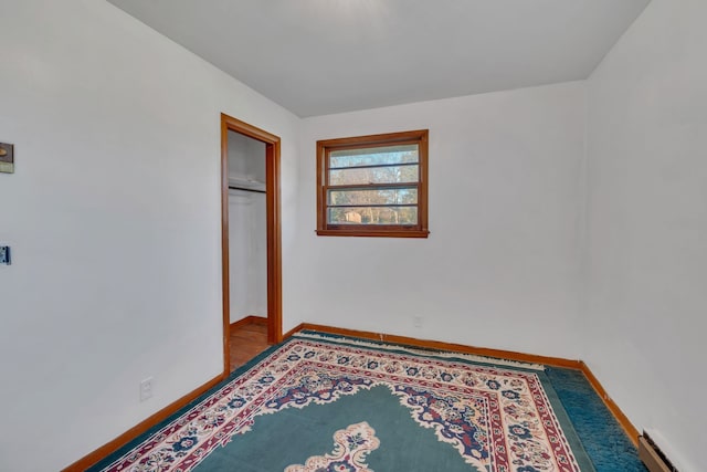 bedroom featuring a baseboard radiator