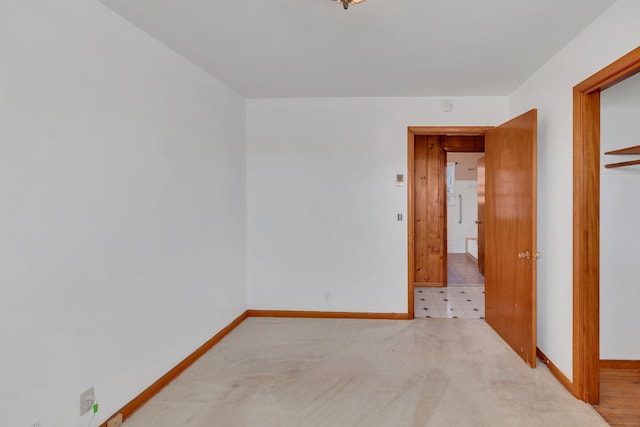 empty room featuring carpet flooring