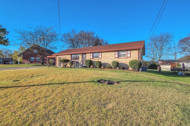 single story home with a front yard