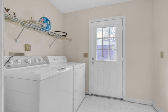 clothes washing area with independent washer and dryer