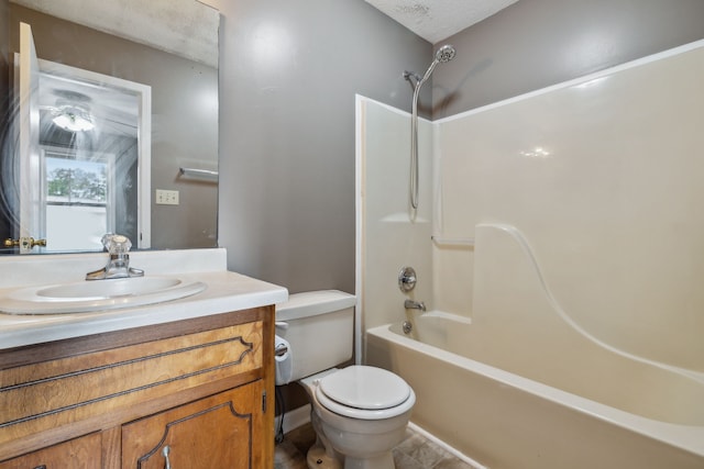 full bathroom with vanity, a textured ceiling,  shower combination, and toilet