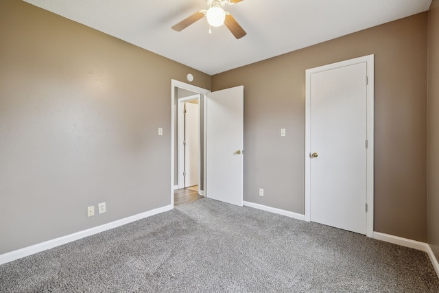 unfurnished bedroom featuring carpet flooring and ceiling fan