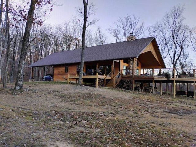 view of front of property with a deck