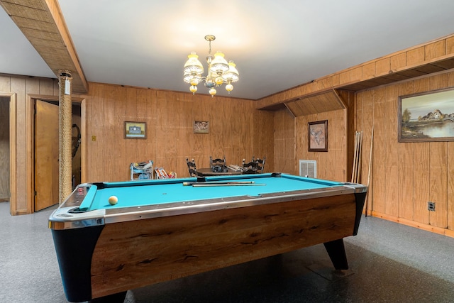 game room featuring a chandelier, wooden walls, and pool table