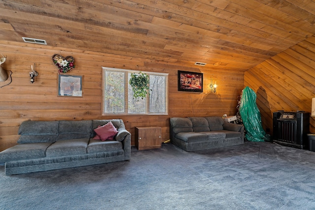 living room with carpet, lofted ceiling, wooden walls, and wooden ceiling