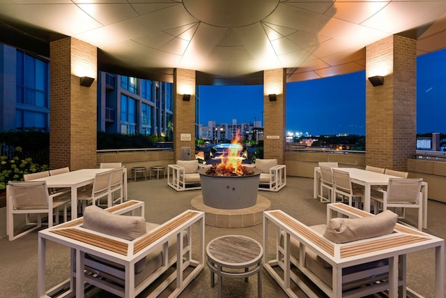 patio at night with an outdoor fire pit