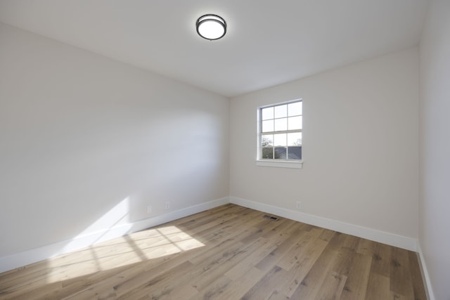 empty room featuring light hardwood / wood-style floors