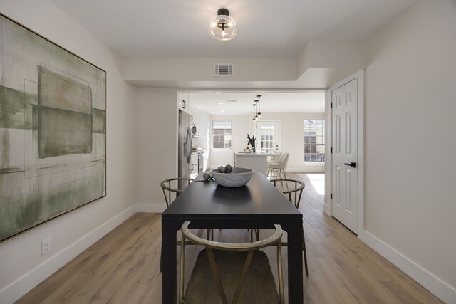 dining room featuring light hardwood / wood-style flooring