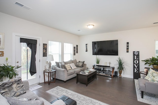 living room with dark wood-type flooring