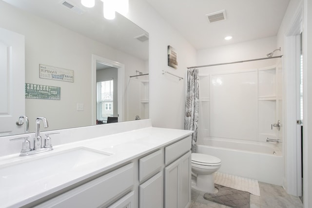 full bathroom featuring toilet, tile patterned floors, vanity, and shower / tub combo with curtain