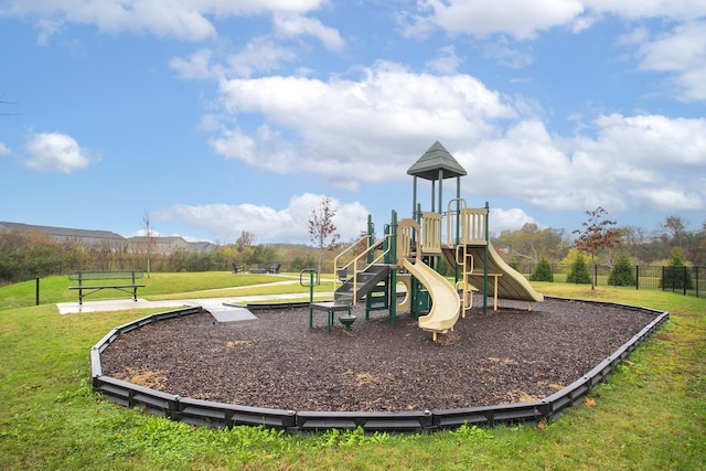 view of playground with a yard