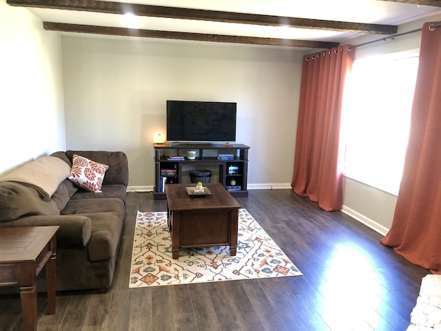 living room with beamed ceiling and dark wood-type flooring