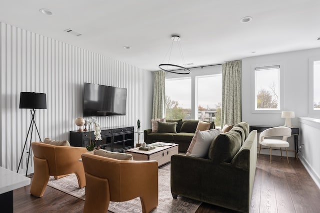 living room with dark hardwood / wood-style floors